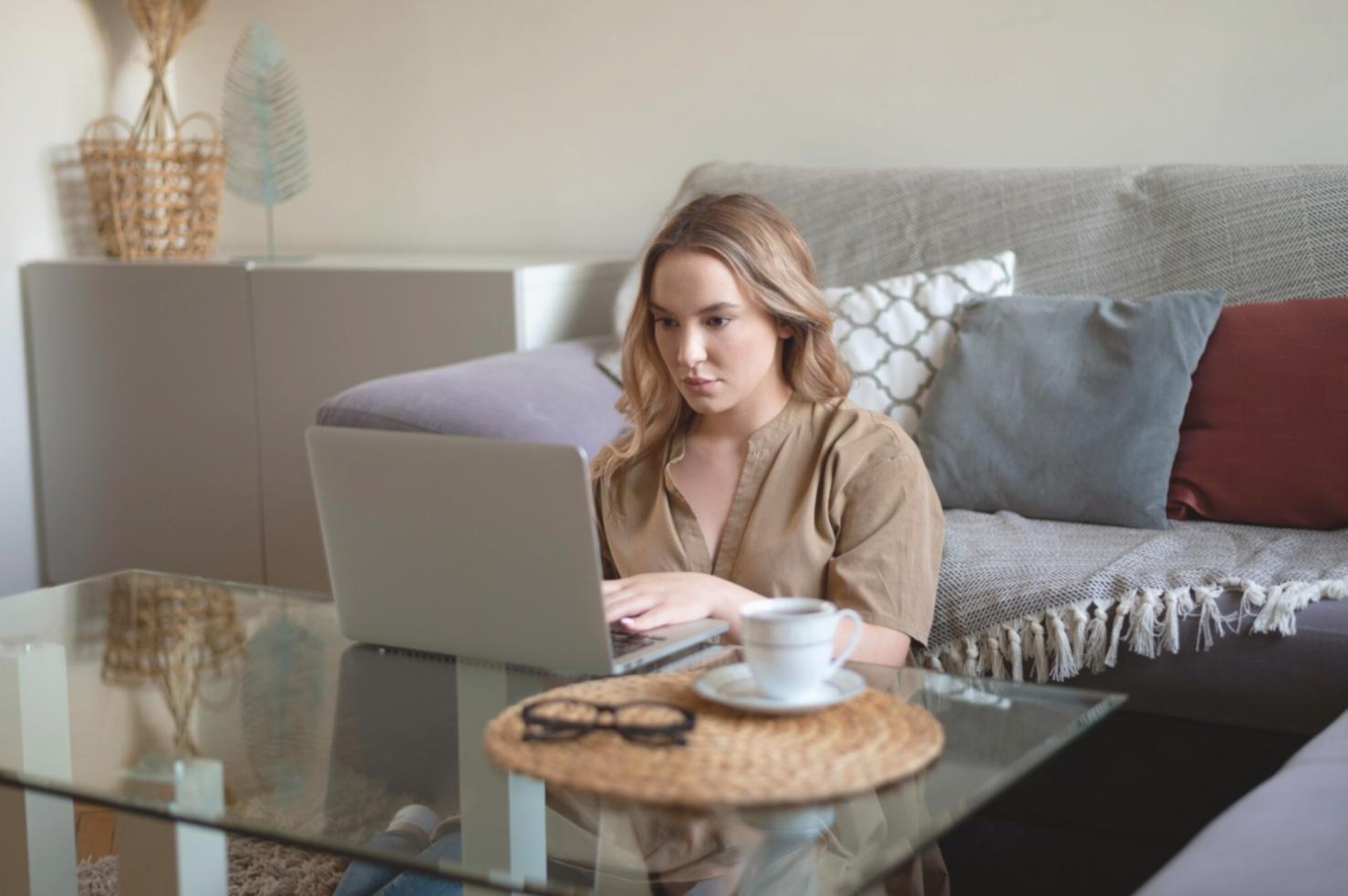 Professional reviewing budget documents and financial charts in meeting preparation