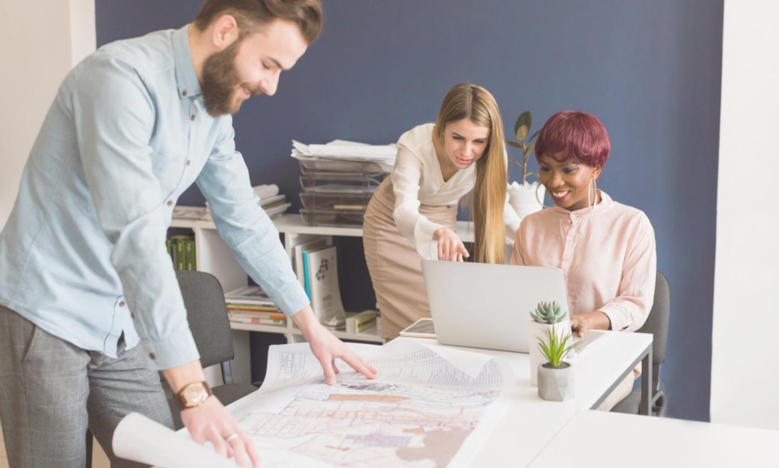 Financial analyst presenting budget data to executive team in modern boardroom